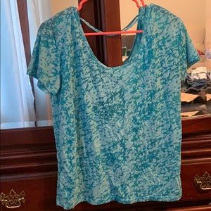 Blue-green/aqua colored open back cropped top